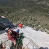 Approaching the belay at the top of the layback pitch, April 2022