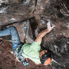 Brian Cork on a 'headpoint' ascent (natural pro, no bolts) of "Insecticide".   Runout between a few nests of decent small cams and tiny RPs, not recommended!    PHOTO: Ryan Moss