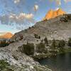 Afternoon light on Hawksbeak Peak (back left) and the Watchtower (upper right) from Tower Lake.