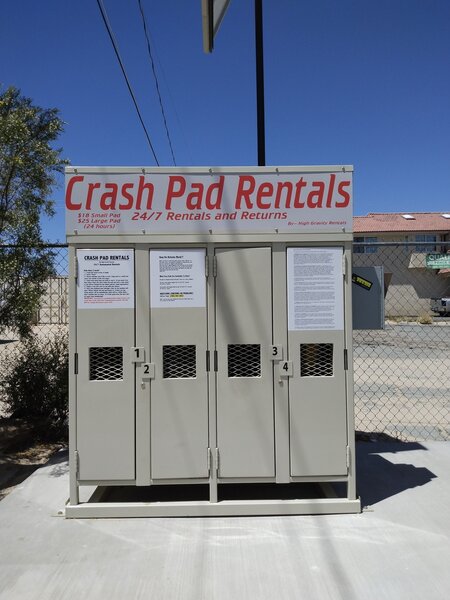 Crash pad rental kiosk in the Nomad Ventures parking lot.