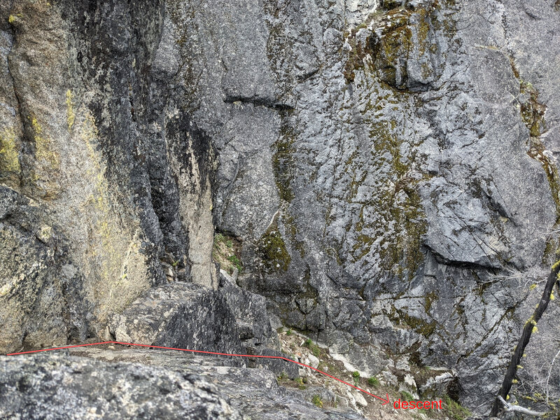 Descent route.  There is a tree near where I am standing taking the photo with slings to rap into this gully which you can then walk out of and back to the base.  Can also downclimb (low fifth class) avoiding the need to rappel.