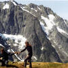 Johannesberg Mtn. from Sahale Arm. Bob Rose and Kathy Lord share  a canteen. Aug. 1970