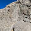 The identifiable crack that splits The O Face wall as seen from the power station across the river.