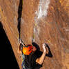 Bryce Belshin channeling his full focus as he stares down the crux lock.