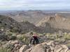 Mari scrambling to the summit. The scramble is a fun little extension, the views alone are totally worth it.