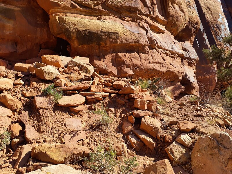 Photo from BLM Monticello Field Office showing stacked rock and remains of prehistoric granary structure.