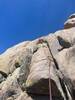 Erik Lehnhoff heading up P2, hanging out over the chasm. Photo used with permission from Jeff Erwin.