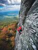 Traversing from the crack to the pitch one belay.