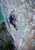 Eli on the upper crimpy section before the final crux finger crack