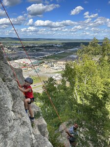 Leo braving the heights. Eric manning the belay.