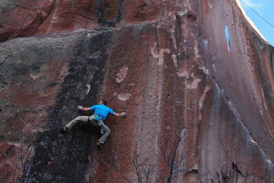 Power Play, Penitente Canyon, CO. Mike is in the second boulder problem about to hit the redpoint crux.
<br>

<br>
Photo by Janelle Anderson.