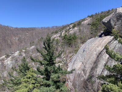 Clipping the last bolt on Pleasure Dome. Photo by John Wright.