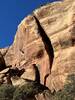 Climber visible at the top of the crack