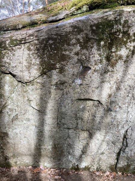 Dark area marks missing section of starting hold at head height. The break left a shelf for the right hand.