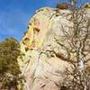 Left crack is Cruising For Bulgar, Rt-facing Dihedral is Good Cleavage.  Sick And Wrong goes right from Crusing at the roof, then up the prow.  Dreams Of Light is partially visible in the shade to the left.... 