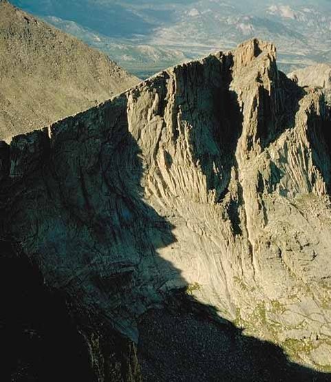 S face of Arrowhead, seen from Dog Star on McHenry's Peak.  Warhead climbs the sunlit face R of the jagged shadow line.