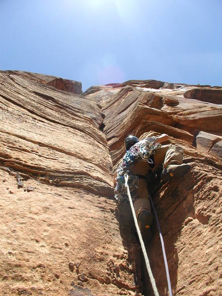 Heading for the bolt in the offwidth on Pitch 2 (5.9).