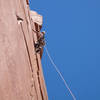 Andrew starting the thin traverse on P2 of Chip Tower