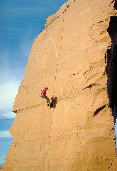 Tom Ruwitch rappels the south side of Unknown Sister, following the first ascent of the west face crack.