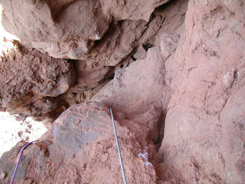 Looking down at spooky, 5.4 climbing on pitch 2.