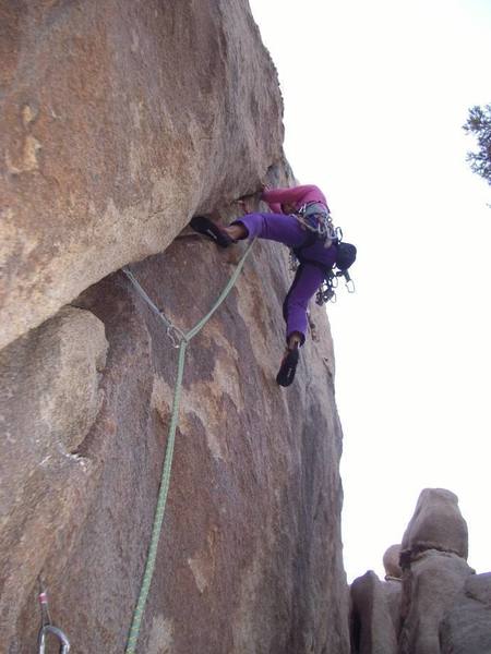 Looking for a secure foot placement within the crack. Photo by HHH.