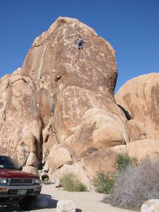 It was cold, thanksgiving weekend 2003, but this route had a really sheltered belay.  Our first route at J-Tree, we thought it was 5.6d/5.7a, and the nice gold rock was worth the long drive from Denver.  The short approach was especially nice and we noticed very little traffic noise compared to Clear Creek or Boulder Canyons in Colorado.<br>
<br>
We also did El Chivo, 5.9a , a route who's steepness, shelter, anchors, and good bolting made pulling on the loose rock very worthwhile. <br>
<br>
We carried no guide and mostly got on routes that had visible anchors, good protection, and winter warmth. Turns out our favorites were all Todd Gordon routes.  Thank you Todd!<br>
<br>
Submitted by Trout/Slater family