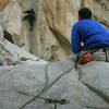 Jen at the stemming crux on Coarse and Buggy.