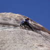 Christa Cline on the angling crack halfway up the pitch.