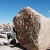 Dan entering the crux on Dynamo Hum (V1), Joshua Tree NP