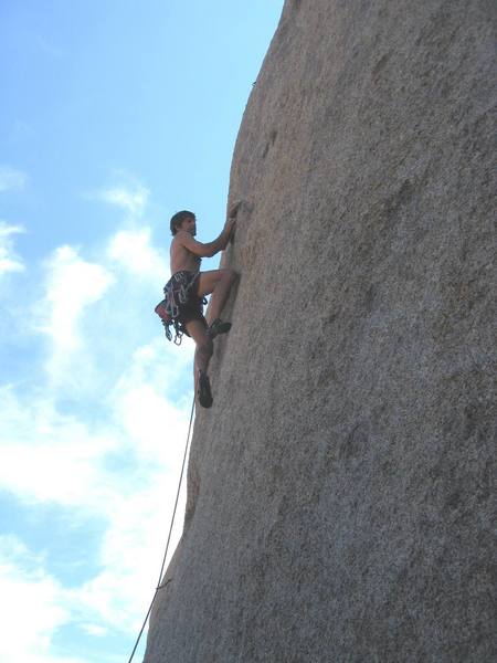 Moving past the second bolt on the sustained 5.11 lower portion of the route. Photo by A. Jr.