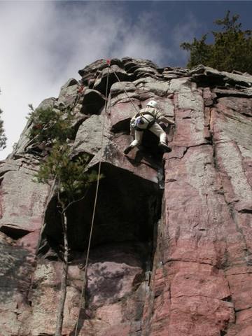 Jan Brown above the roof.  Some might call this thin section the crux.