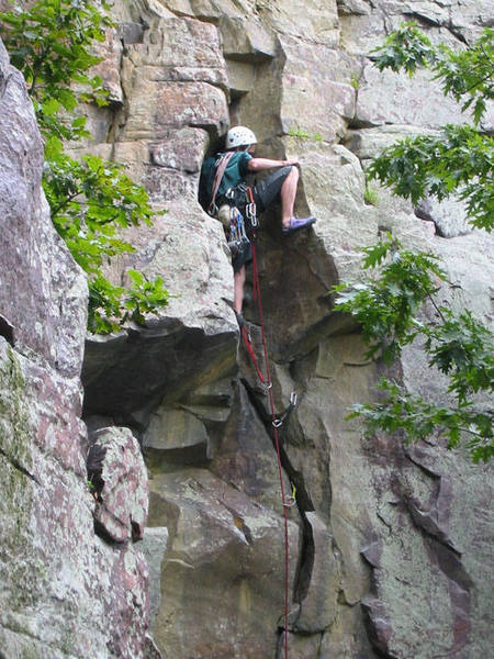 Carey Kireyev exiting the chimney (crux) of Tibia Crack. Photographer Mike Lopera