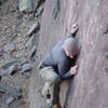 Nice picture of Harris crimping and smearing on the slab at the start of the Green Bulge.  It is very fun to bolder on the slab. 