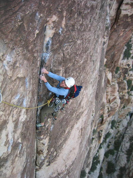 Janet contemplating the routes crux, P4.