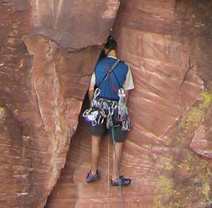 John employs a headjam in order to free his hands maybe for a quick pee?