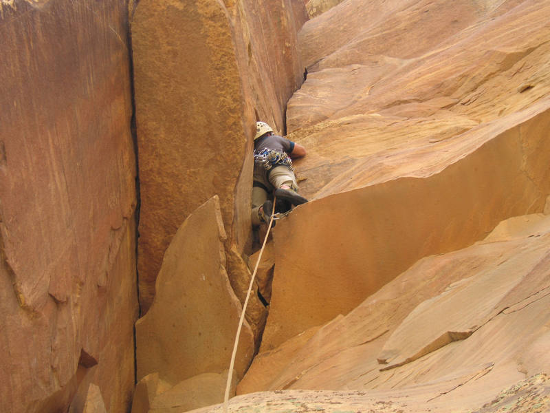 Josh climbs p4 of Triassic Sands