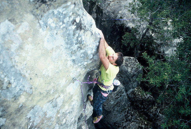 Dave Caunt in the middle of the crux of "Rigormorris" (5.12a), Summit Rock, Sanborn Skyline County Park, Skyline Ridge, California