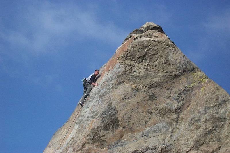 Paul making the final delicate step up to reach anchors.