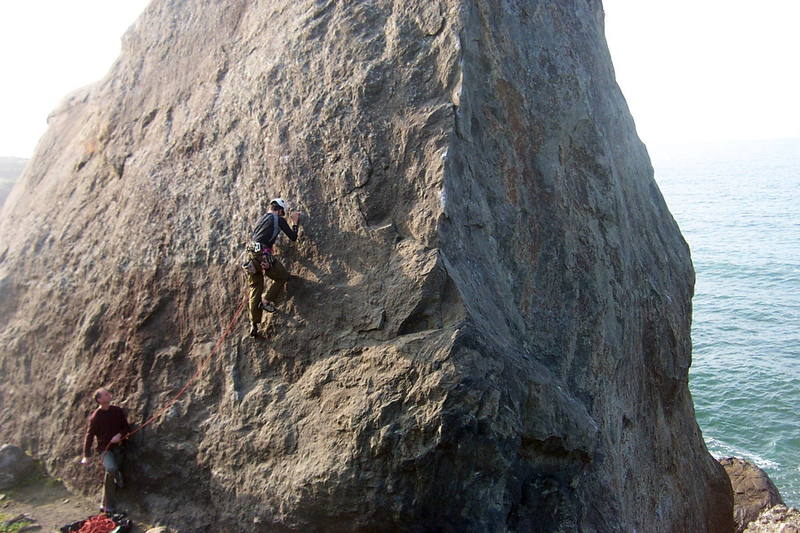 Paul Rezucha belaying Justin as he passes the first bolt on Egg Face.
