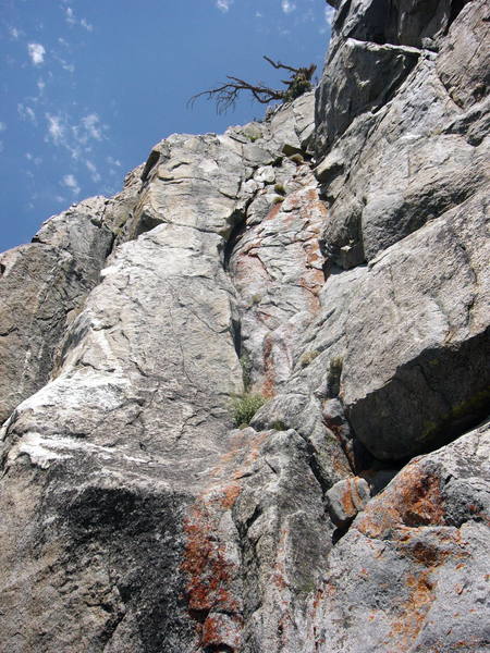 Widow Maker climbs the orangish rock at bottom right, traverses left and up the beautiful face to the top.