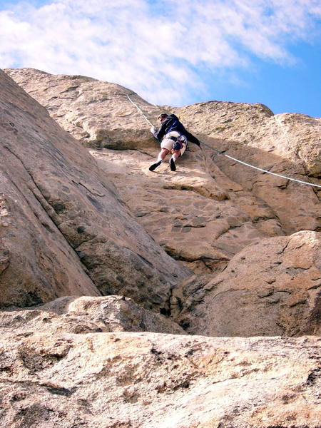 Joe getting ready to move left... a long step to a very thin foothold.