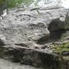 Photo from the first bolt (on the left). Bottom 12 feet of the route not visible.  Second bolt to the right of the first, just above the large hueco. Route continues up and right to an arete. Follow the arete to the two bolt anchor. Photo by <br>
Swansonbro