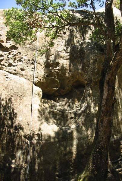 The middle section of the middle tier. Climb left out of the big bucket for a 5.9, or climb straight up for a 5.11. 