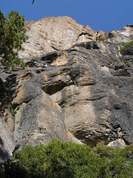 The 3 vertical sections and first 6 bolts of toilet earth.  Climbing after the picture is a 5.1 slab that heads up and left towards the copper flake.  The last move is about 5.6.