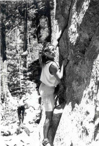 Suzy bouldering at base of Druid, early 90s