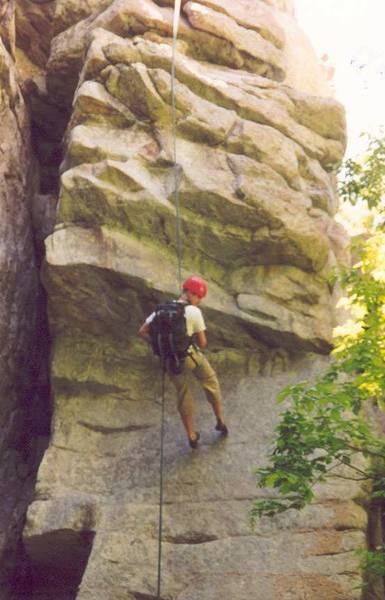 Rapping past the crux roof on Extreme Unction in Ferguson Canyon.