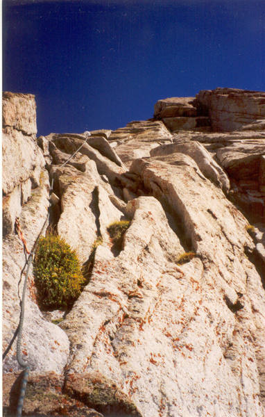 2nd Pitch of Triple Overhangs....some hollow sounding flakes, but super grippy granite....The overhangs are in the shadows in the upper right.  