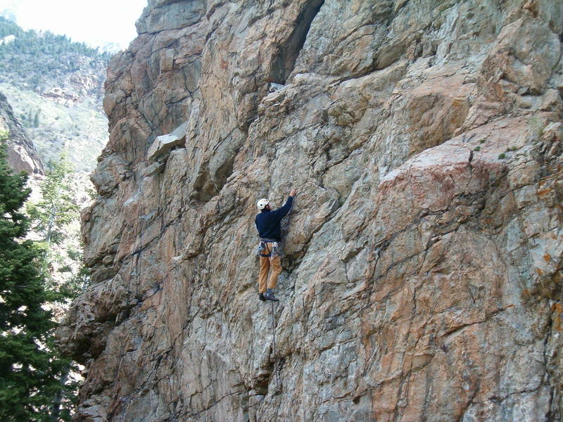 Derek squeezing in a morning climb.