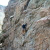 Derek squeezing in a morning climb.