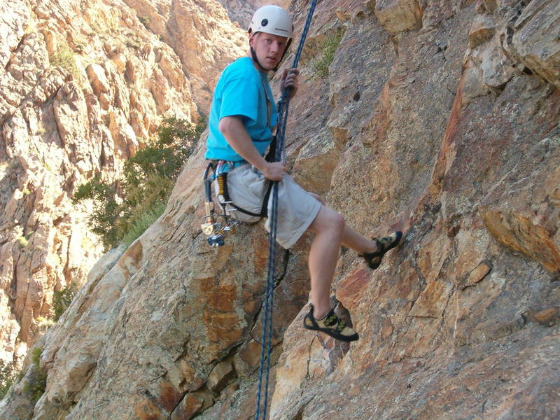Eric rappelling down. 